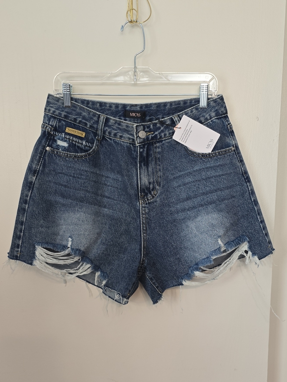 MICAS High-Rise Distressed Denim Shorts in Dark Blue